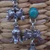 E187 "Sterling Doves with Turquoise and  Navajo Squash Blossoms"