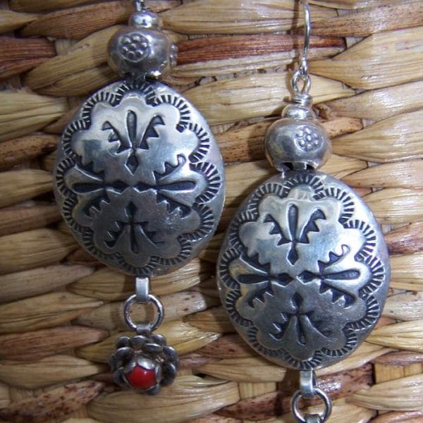 E205  "Small Conchos with Red Flowers"