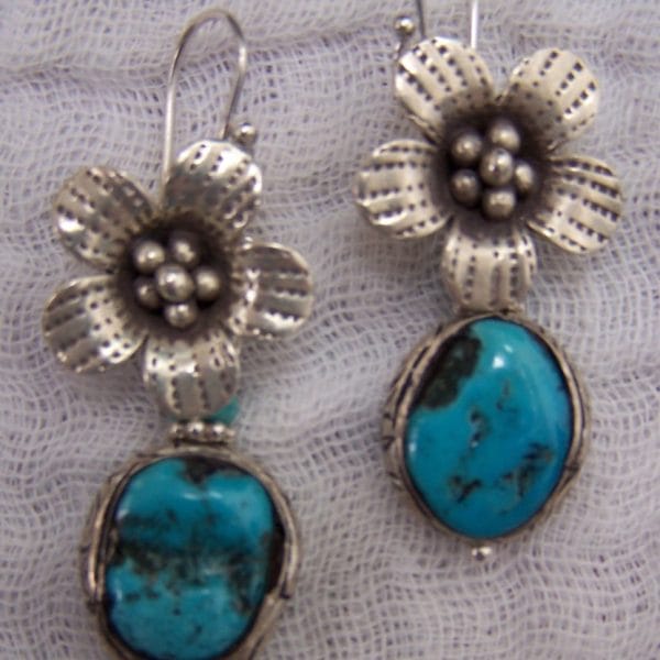 E296 "Sterling flower with matrixed Kingman turquoise in Sterling setting"