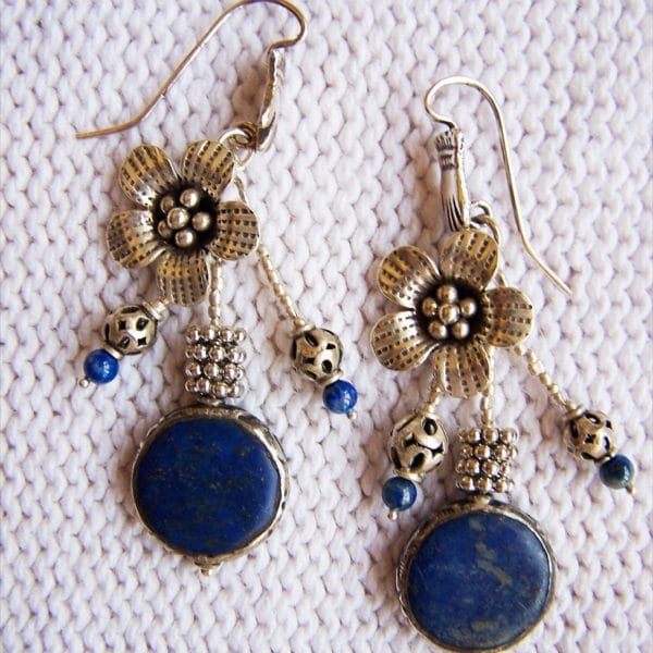 E308 Vintage Lapis Lazuli with silver rim, sterling flower and hand hook